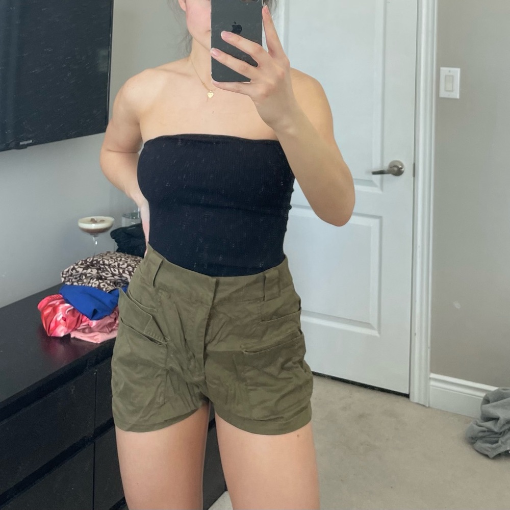 Green cargo shorts with pockets